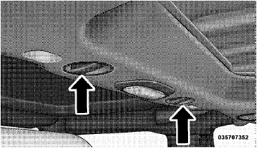 3. Turn the center L-shaped locks (two) from the center of the roof panel.