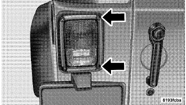 2. Separate the housing from the body by pushing the lamp inboard while pulling